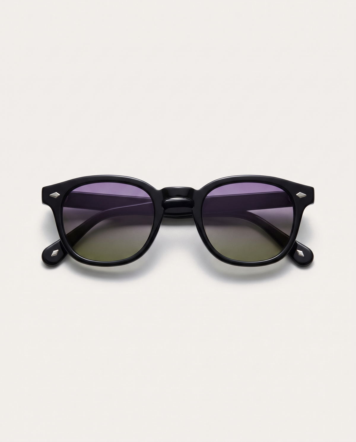 lentes de sol freddi jungle, acetato negro, vista superior plegados
