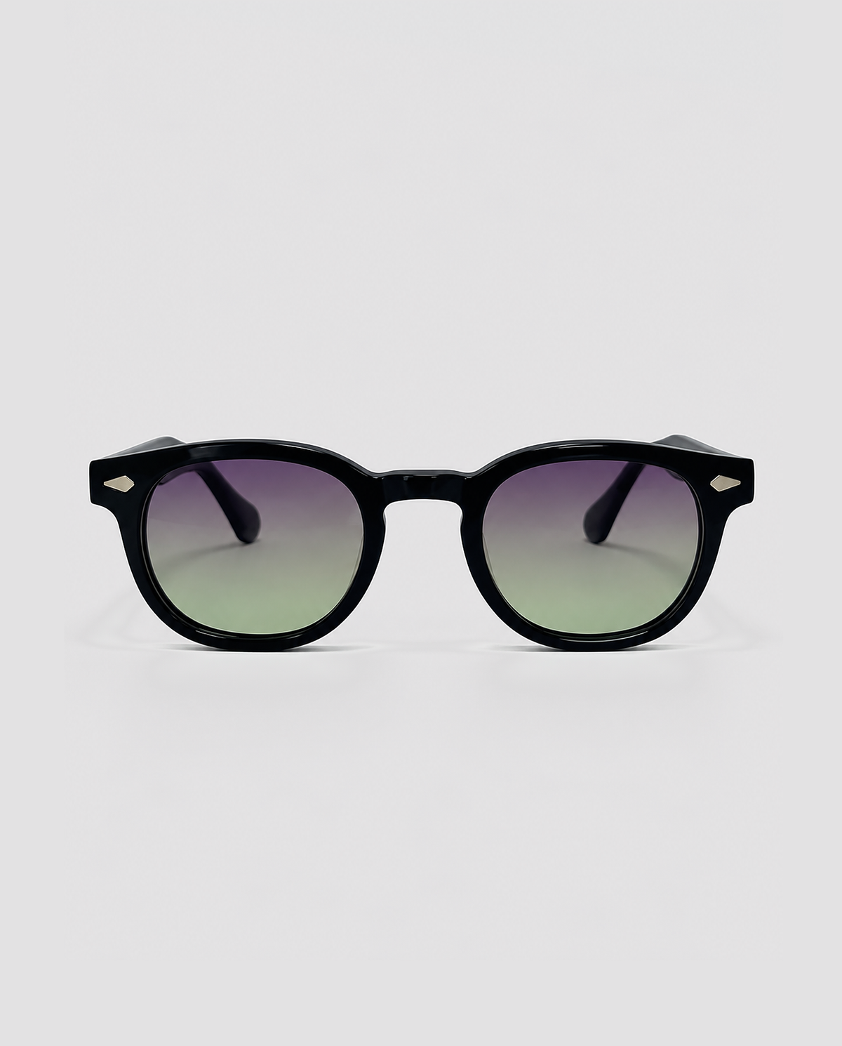 lentes de sol freddi jungle, acetato negro con lente degradado morado a verde, vista de frente