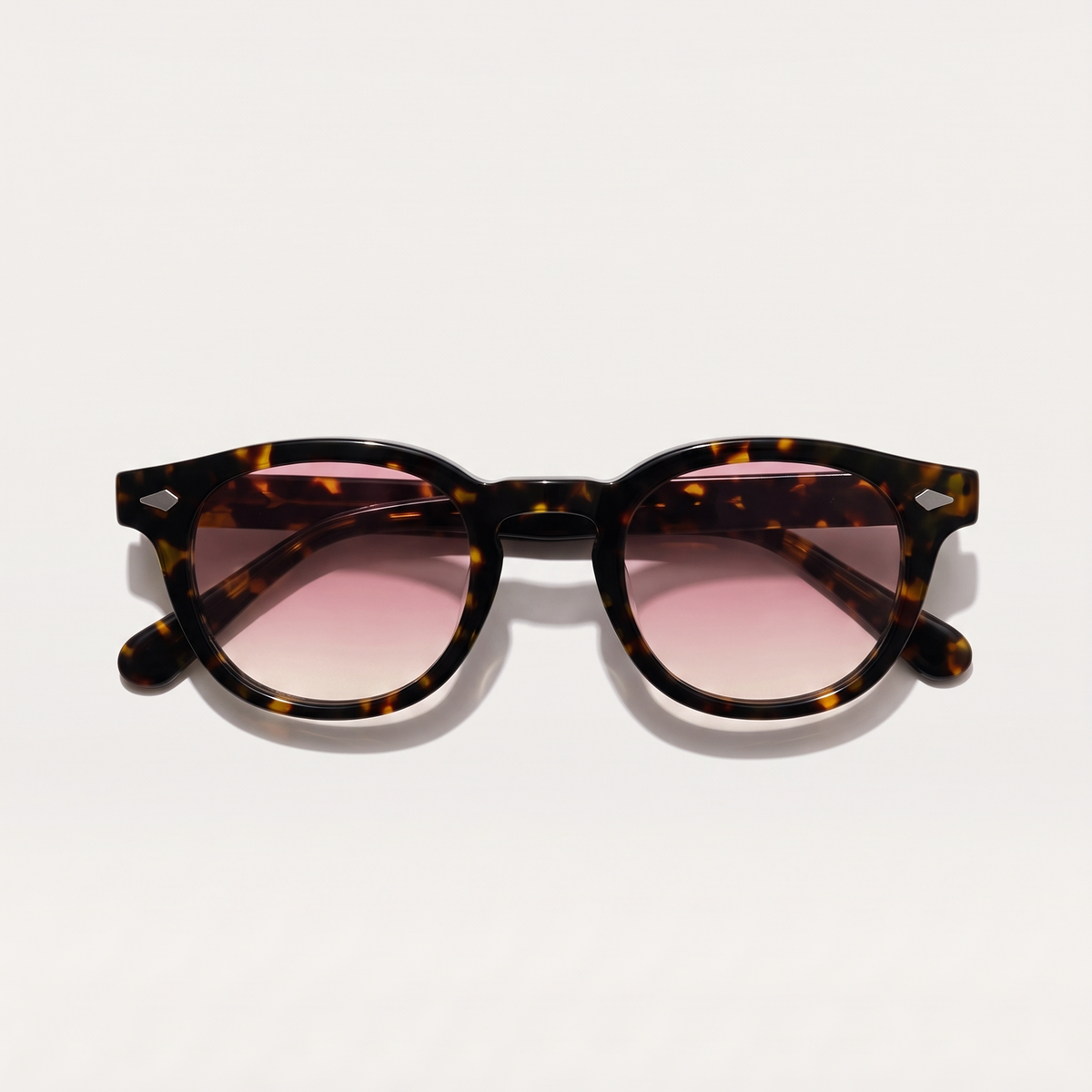 lentes de sol freddi pinot, acetato carey, vista superior plegados