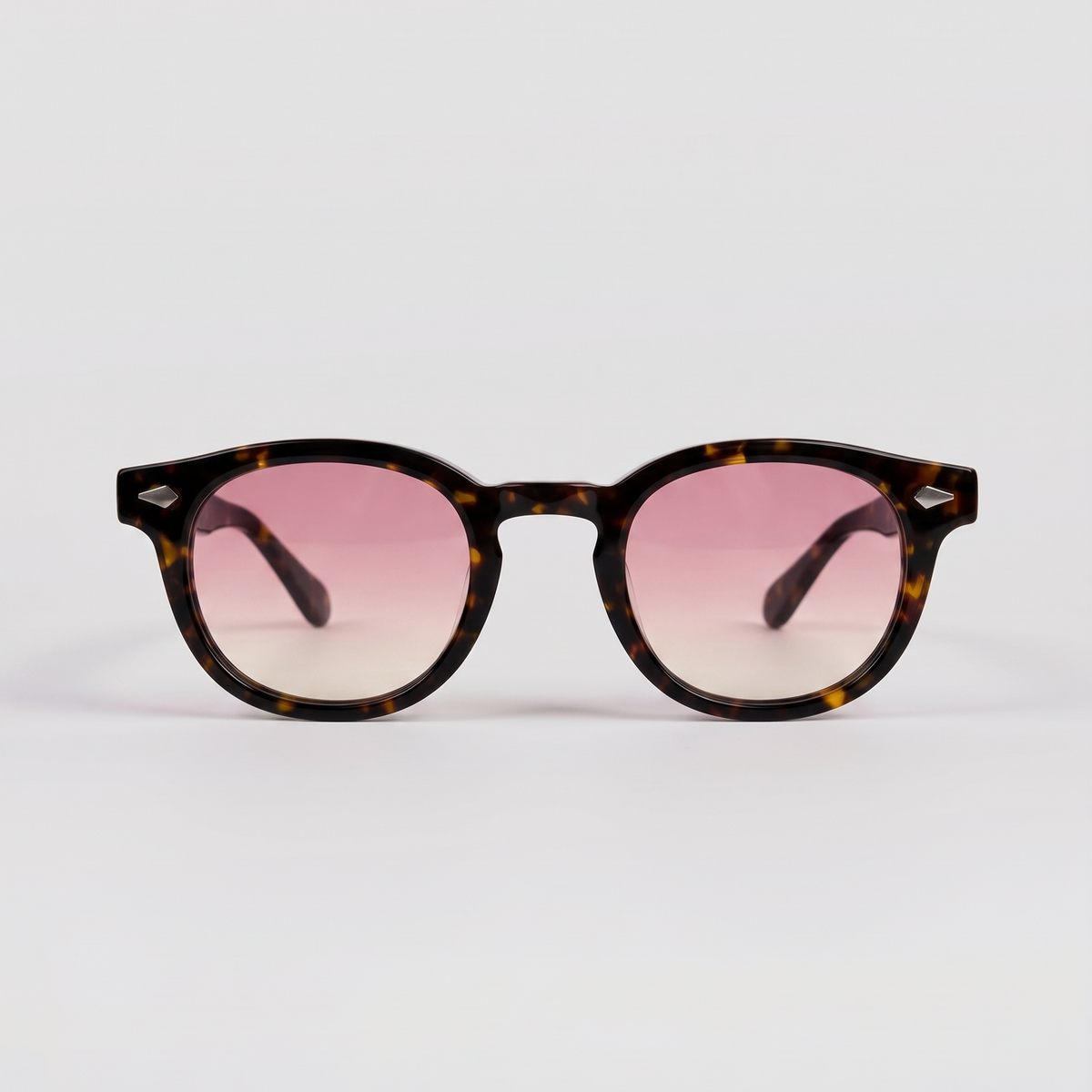 lentes de sol freddi pinot, acetato carey con lente rosa degradado, vista de frente
