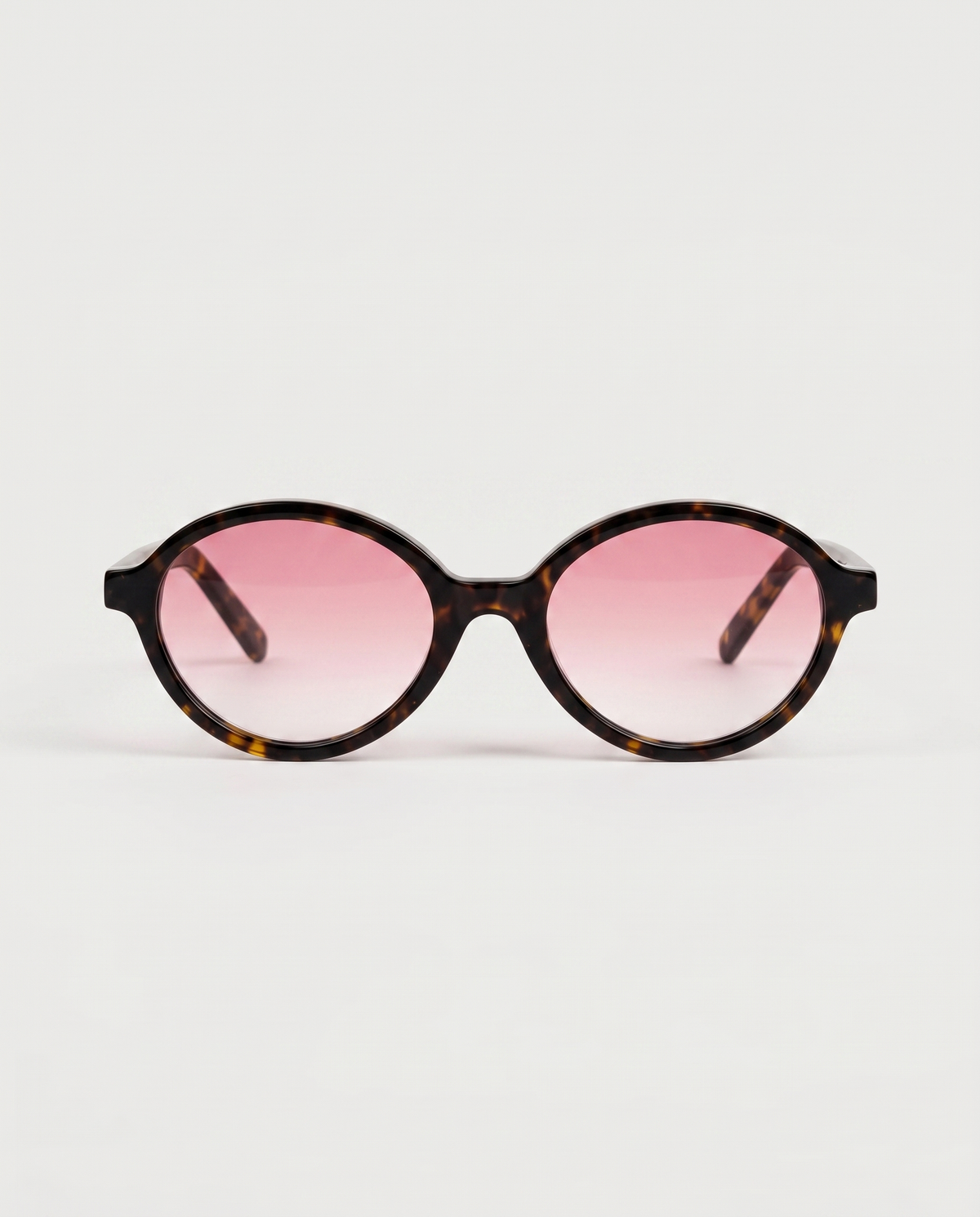 lentes de sol freddi rosé, acetato carey con lente rosa degradado, vista de frente