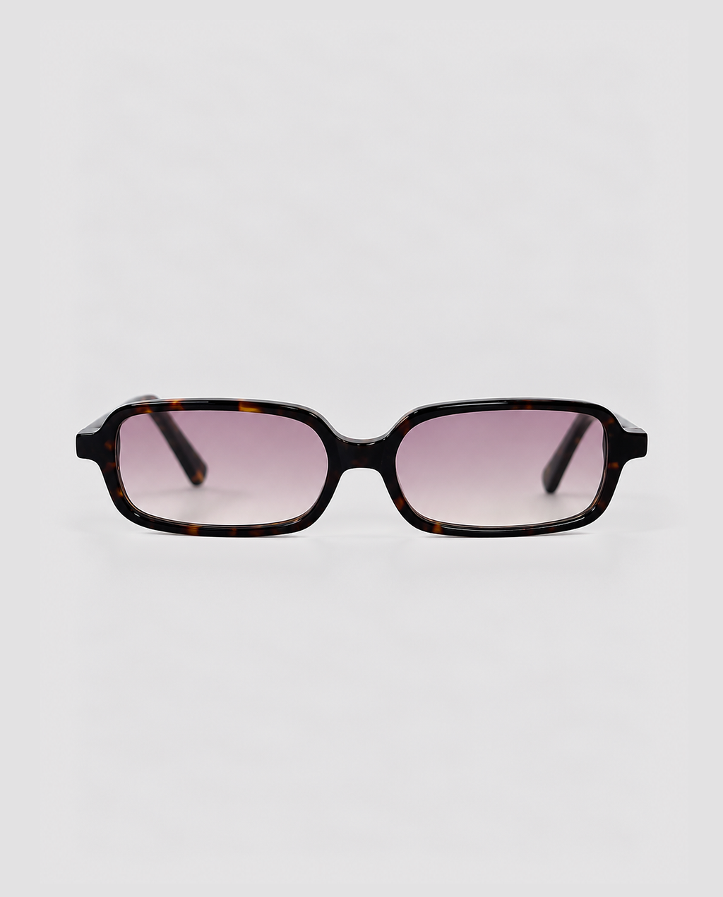 lentes de sol freddi sarti, acetato carey rectangular con lente rosa degradado, vista de frente