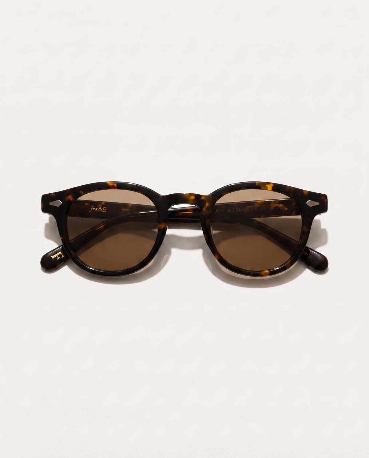 lentes de sol freddi tortoise sunset, acetato carey, vista superior plegados